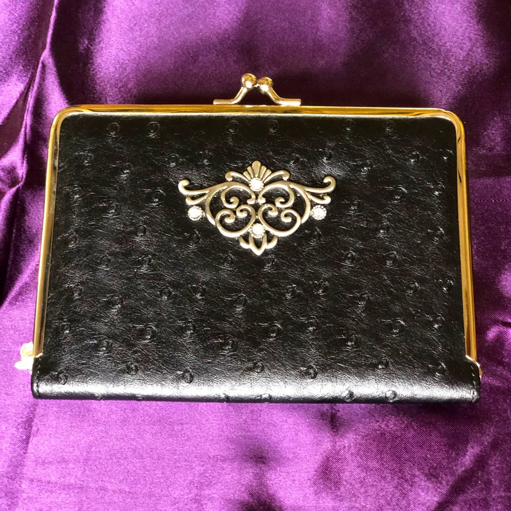 Photo album clutch